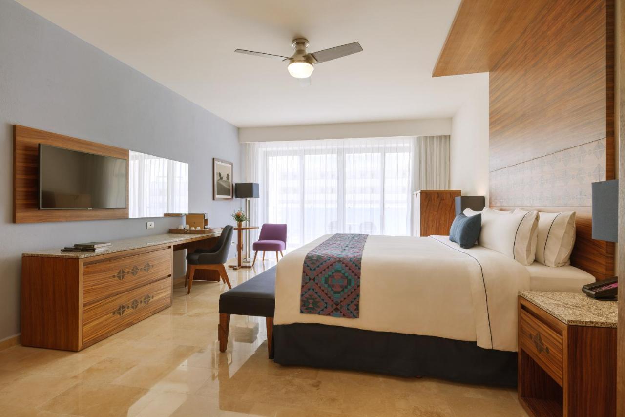 Quarto com Cama King-size e Vista do Mar